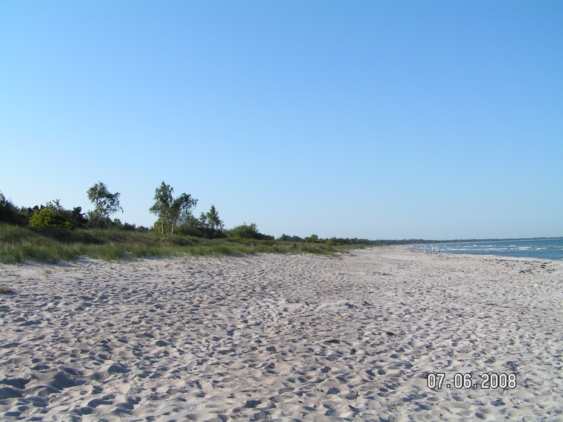 Sildestrup-Strand nördlich von Marielyst mit Düne und Holzsteg